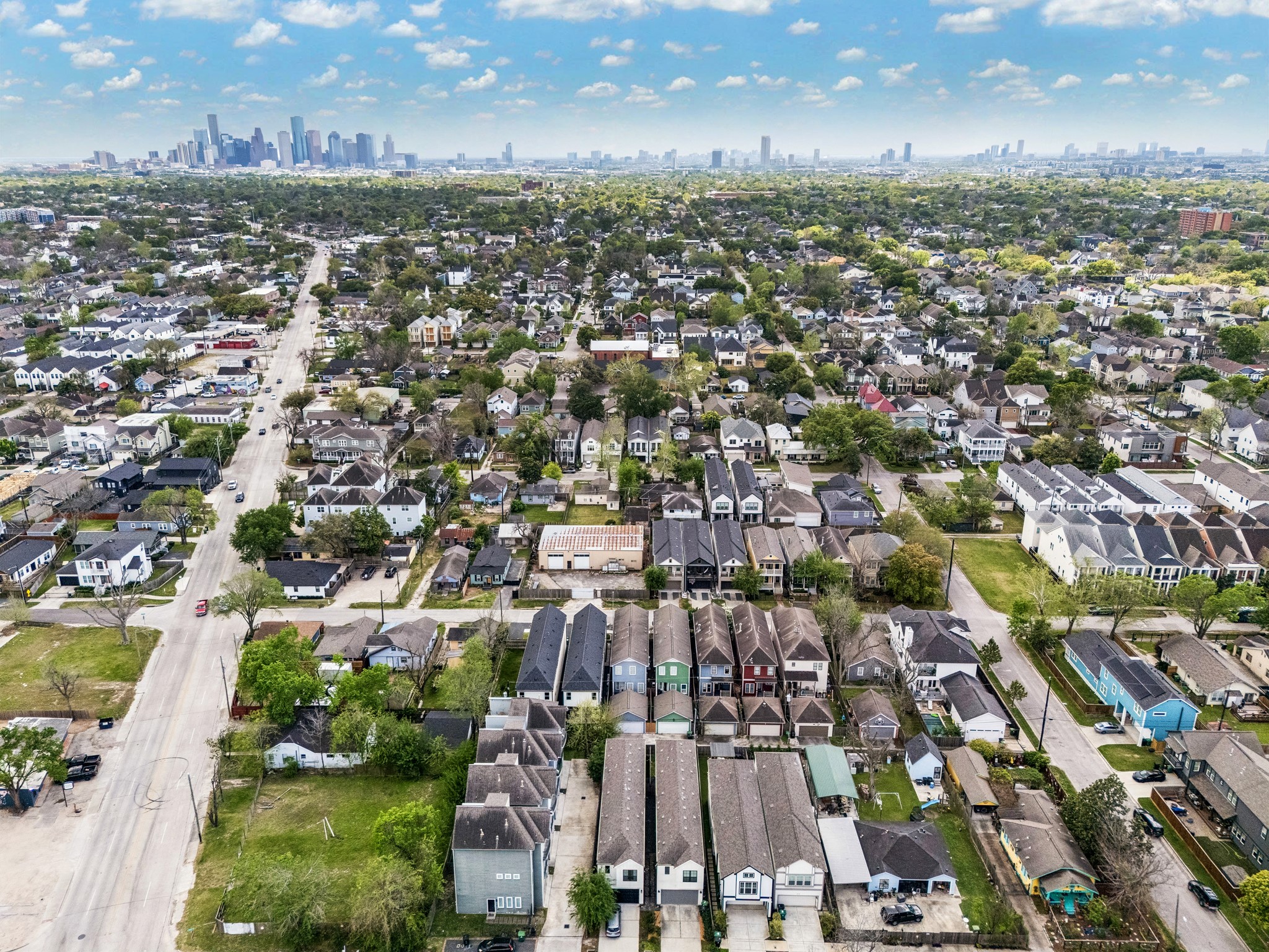 624 East 28th Street Houston, TX 77008 - Photo 33 of 34 Aerial perspective showcasing the home’s location in The Heights with downtown Houston in the distance.