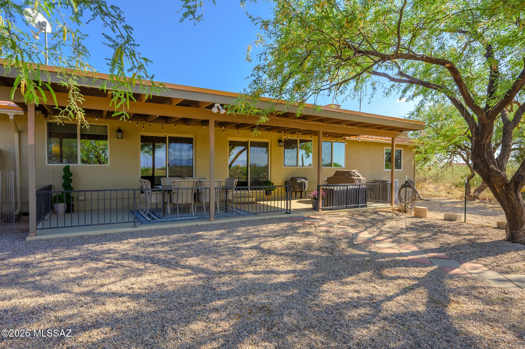 13599 East Rincon Ranch Road Vail, AZ 85641 - Photo 35 of 41 a front view of a house with patio