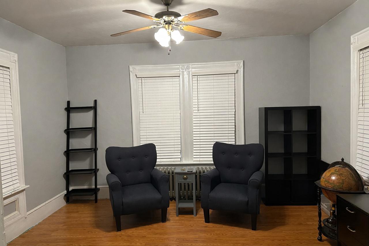 321 West Main Street Millville, NJ 08332 - Photo 3 of 23 a living room with furniture and a window