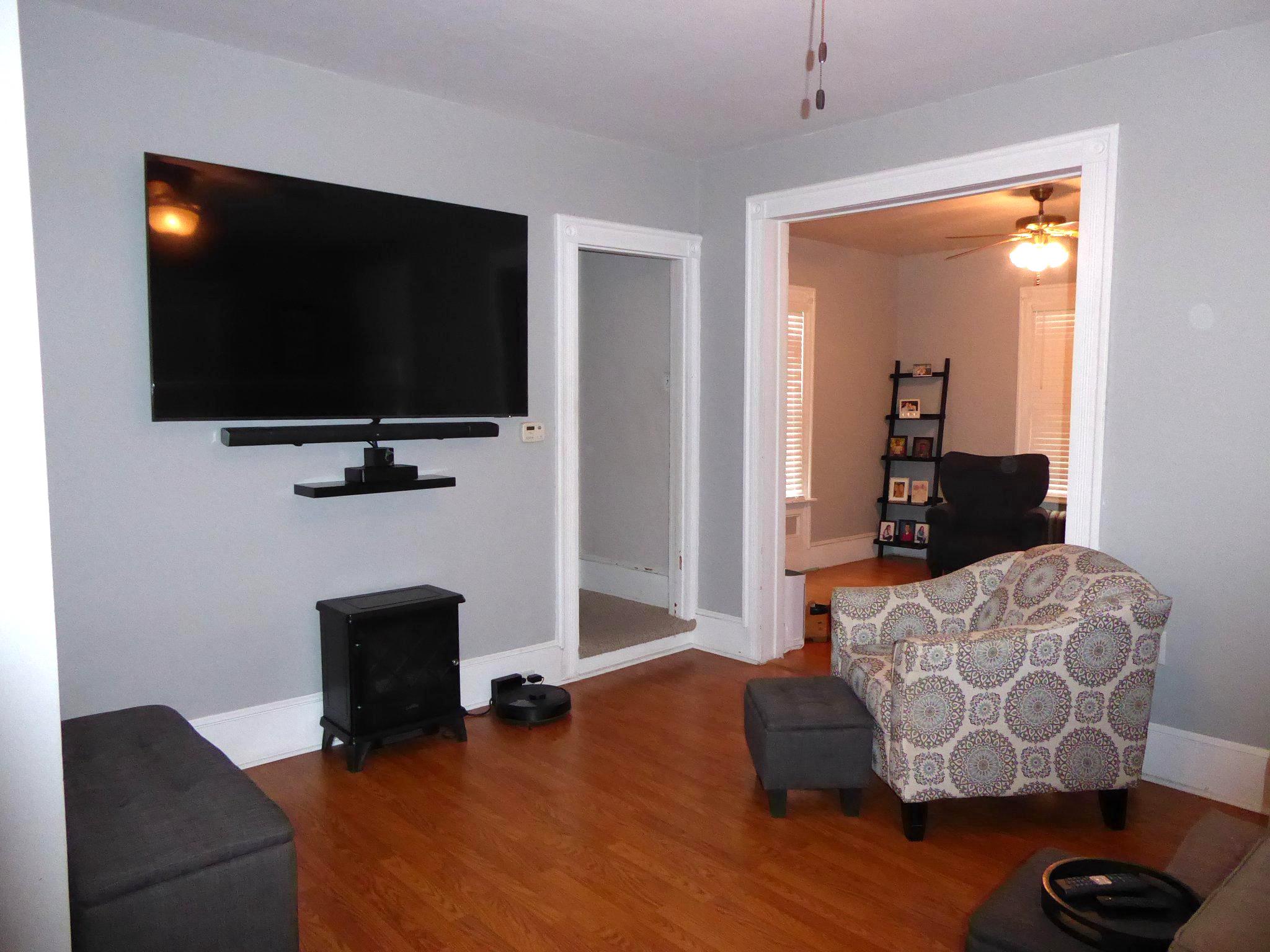 321 West Main Street Millville, NJ 08332 - Photo 5 of 23 a living room with furniture and a flat screen tv