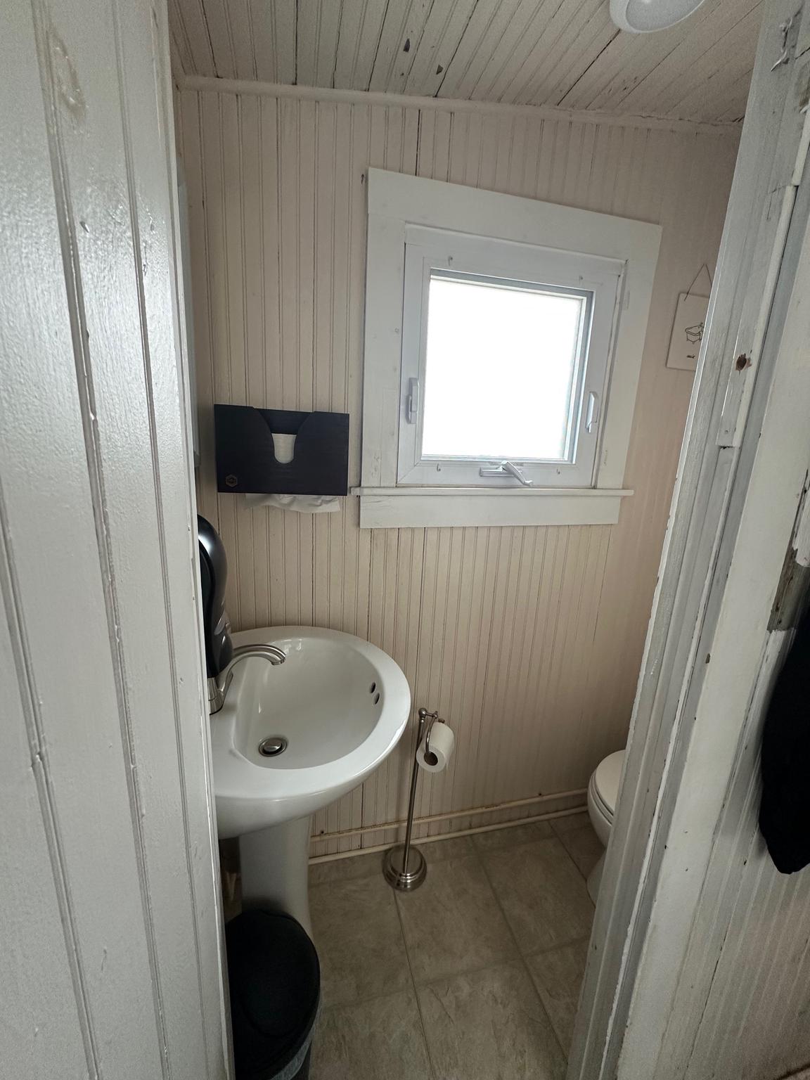 321 West Main Street Millville, NJ 08332 - Photo 9 of 23 a bathroom with a sink and a toilet