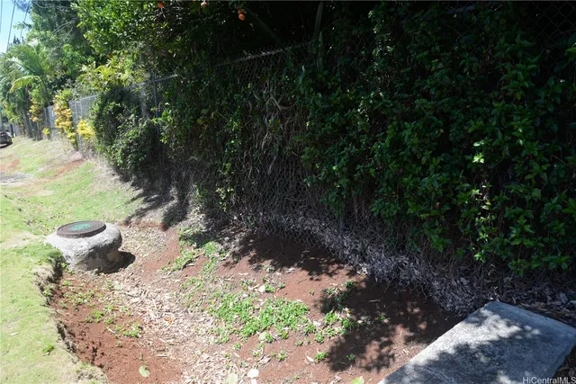 a view of a backyard of the house