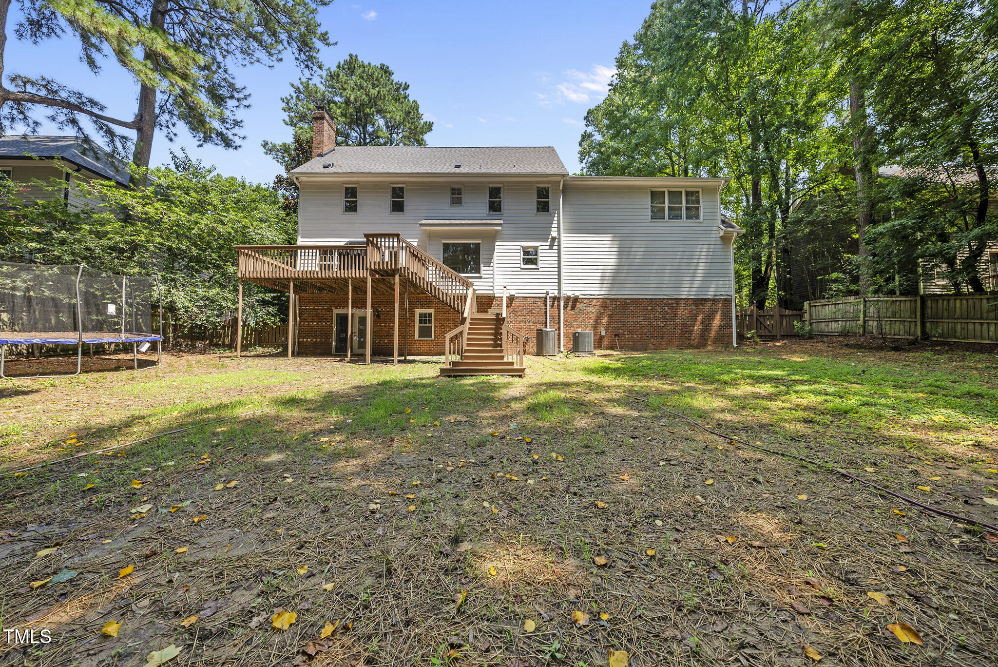 8716 Mourning Dove Road Raleigh, NC 27615 - Photo 35 of 44 a view of a house with a yard