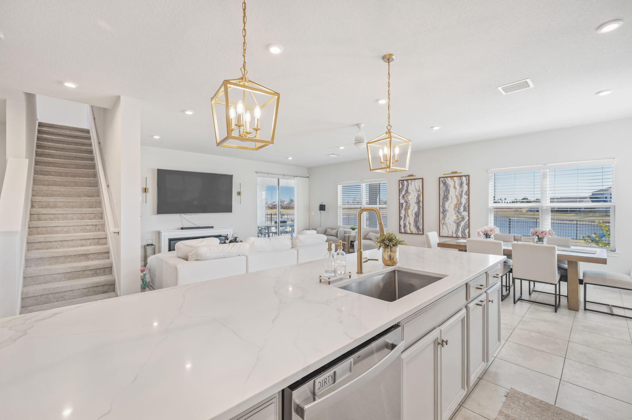 12297 Southwest Forli Way Port Port St. Lucie, FL 34987 - Photo 14 of 37 a very nice looking room with lots of furniture and a flat screen tv