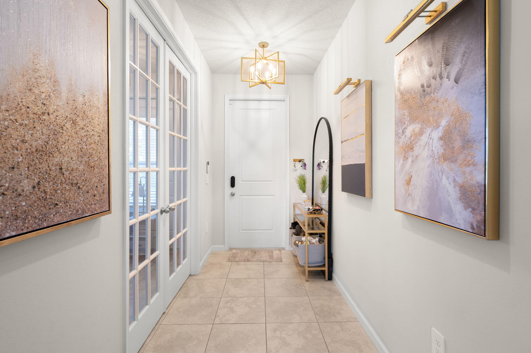12297 Southwest Forli Way Port Port St. Lucie, FL 34987 - Photo 4 of 37 a view of an entryway with wooden floor