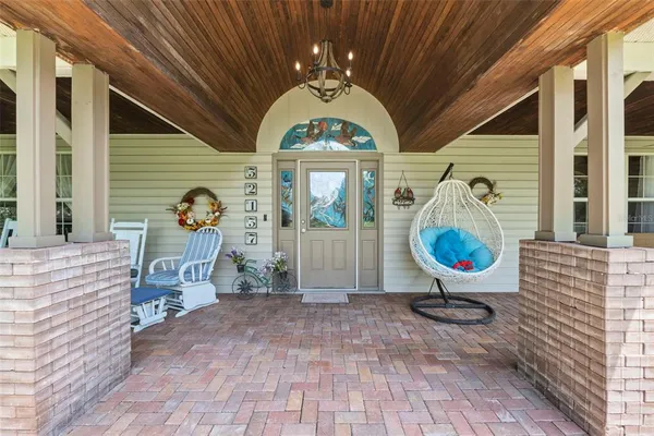 a kitchen with stainless steel appliances granite countertop a refrigerator and a stove