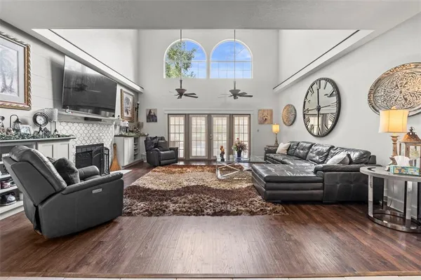 a work room with furniture and wooden floor