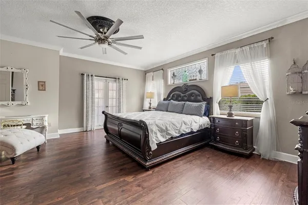 a bathroom with a toilet and a shower curtain