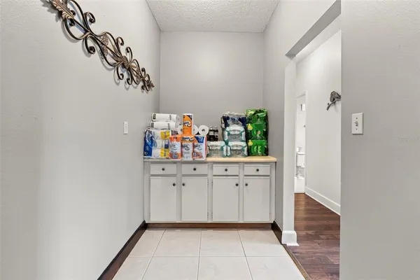 a bathroom with a shower curtain and a toilet