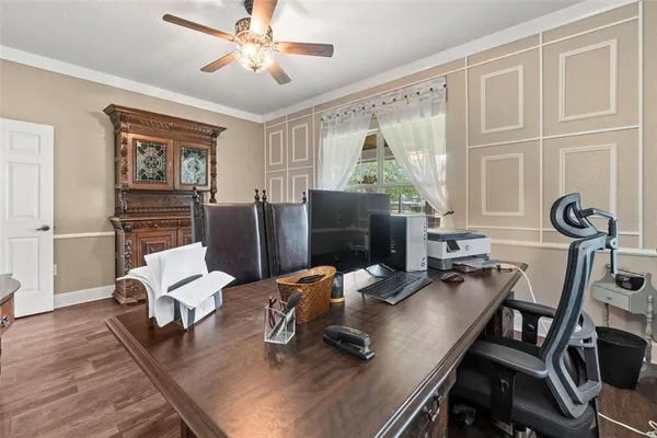 a view of a swimming pool with a patio