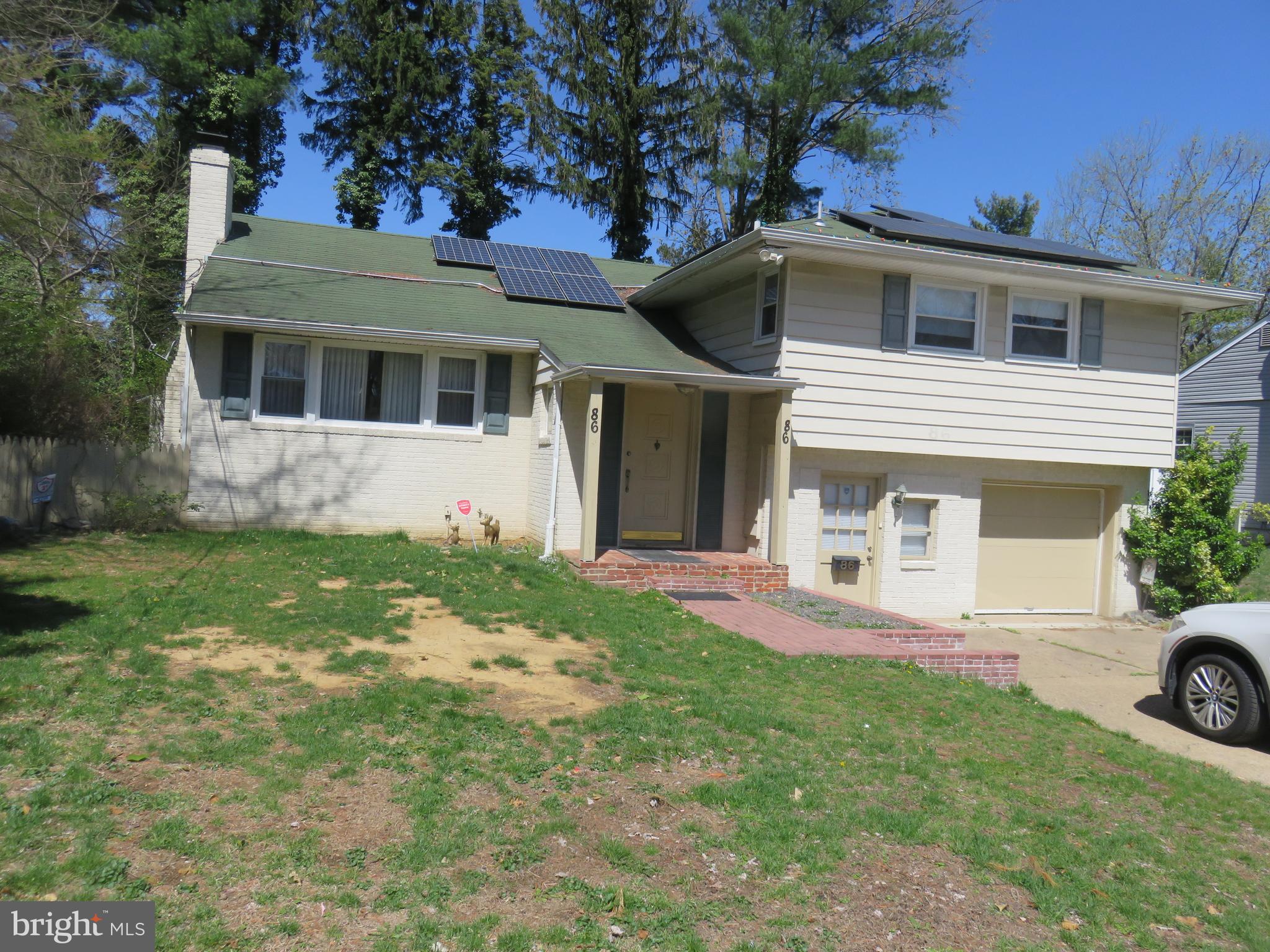 86 Kings Highway North Cherry Hill, NJ 08034 - Photo 1 of 22 a view of a white house with a big yard and large trees