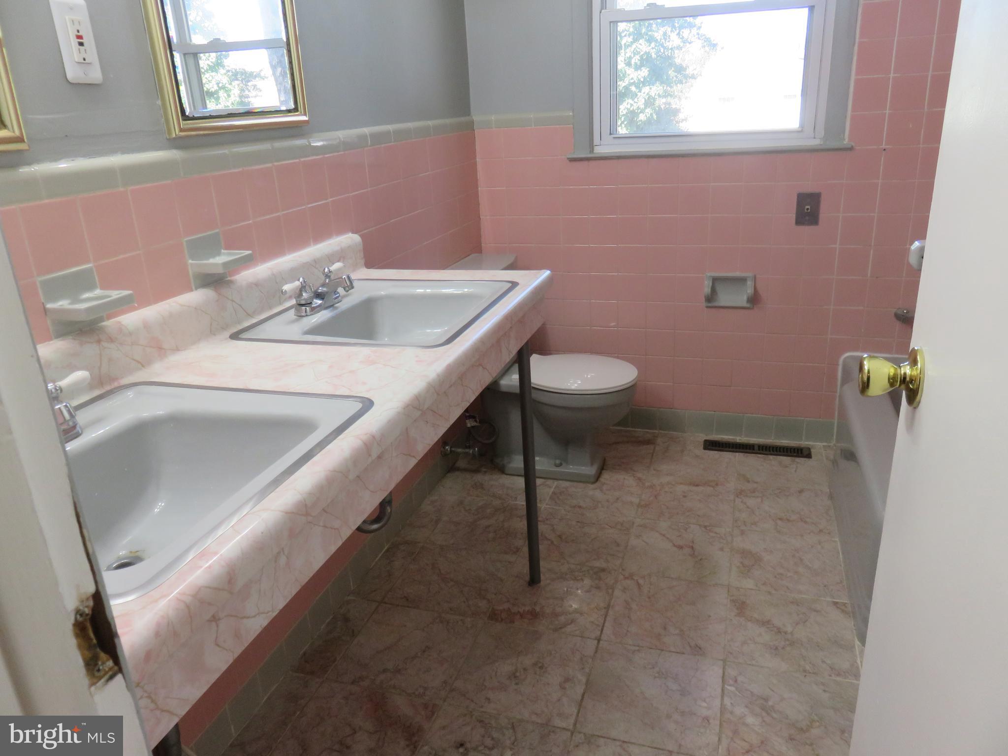 86 Kings Highway North Cherry Hill, NJ 08034 - Photo 11 of 22 a bathroom with a sink and a toilet