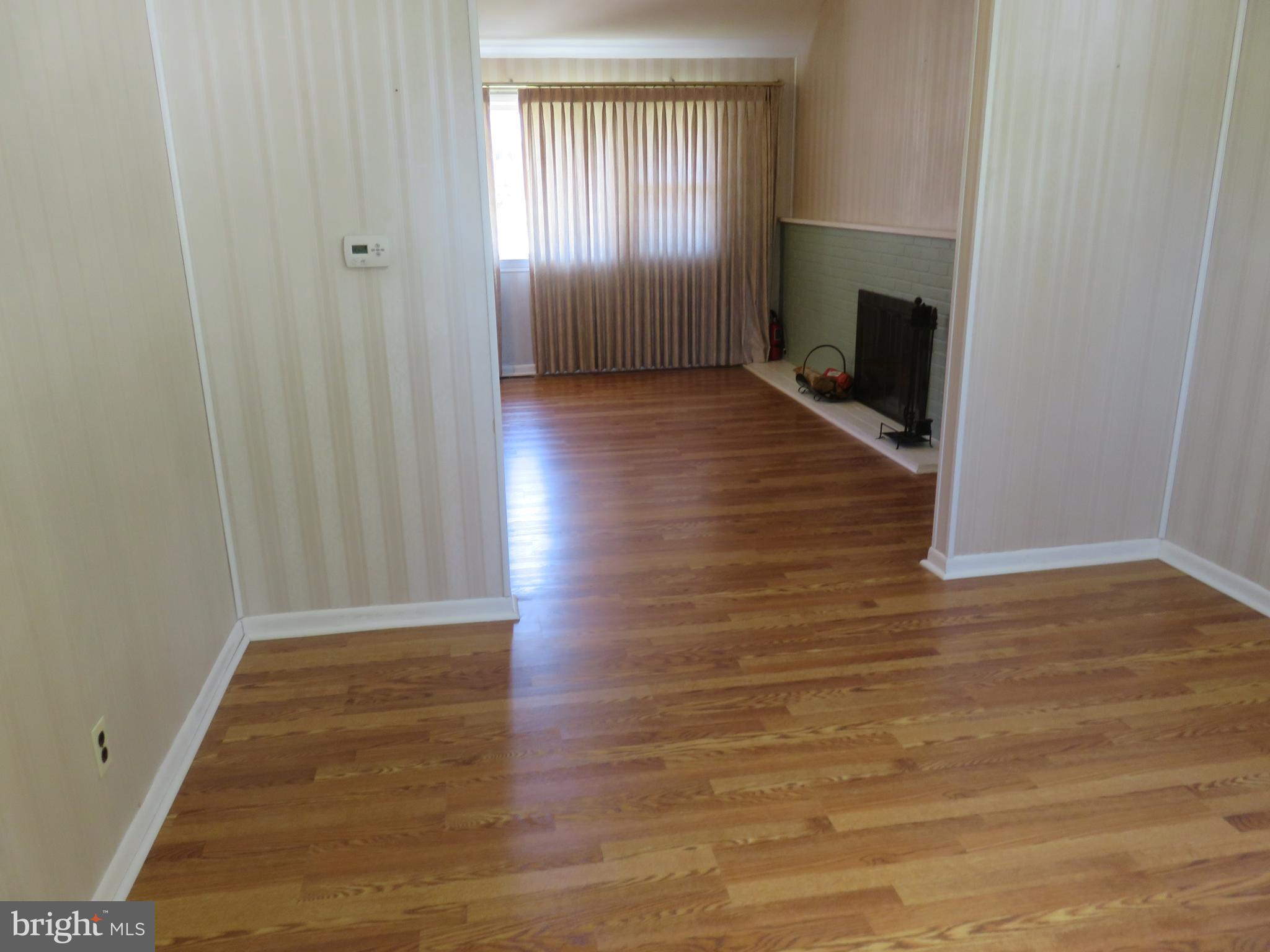 86 Kings Highway North Cherry Hill, NJ 08034 - Photo 15 of 22 wooden floor in an empty room with a window