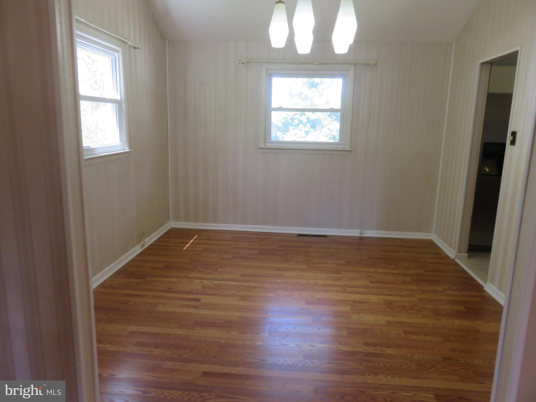 86 Kings Highway North Cherry Hill, NJ 08034 - Photo 16 of 22 a view of an empty room with wooden floor and a window