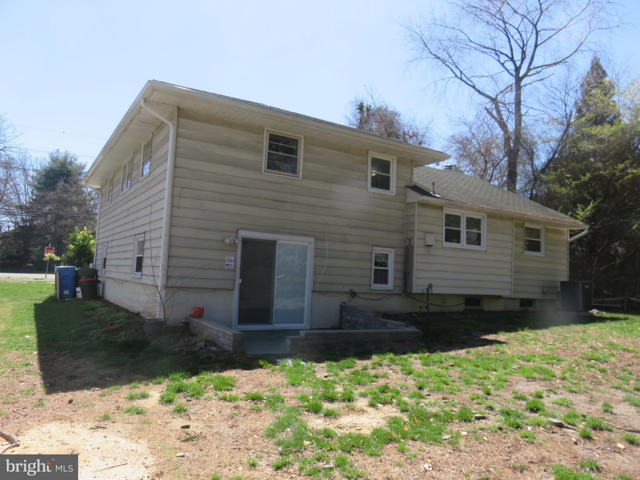 86 Kings Highway North Cherry Hill, NJ 08034 - Photo 3 of 22 a front view of a house with a yard