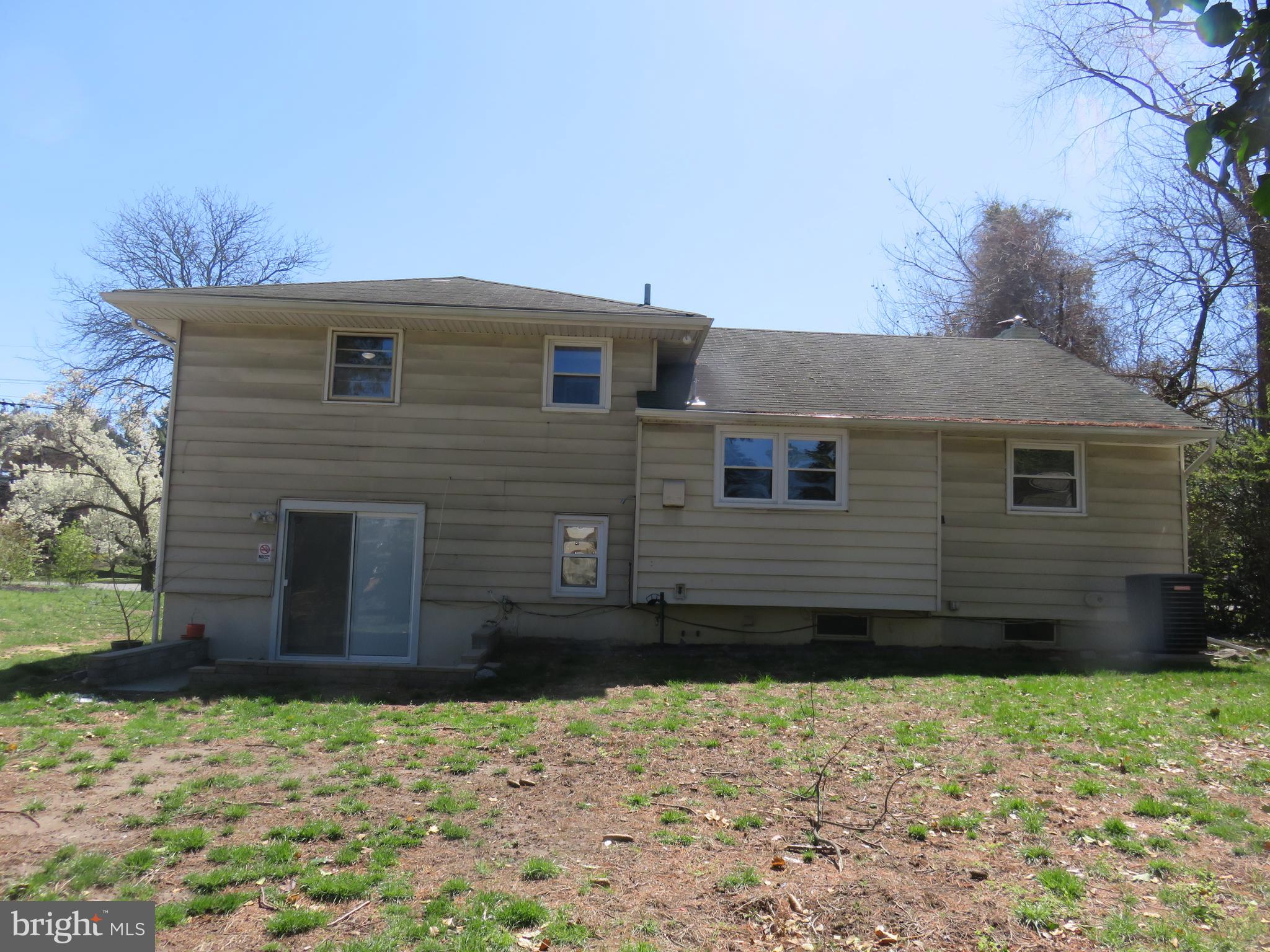 86 Kings Highway North Cherry Hill, NJ 08034 - Photo 4 of 22 a front view of a house with a yard