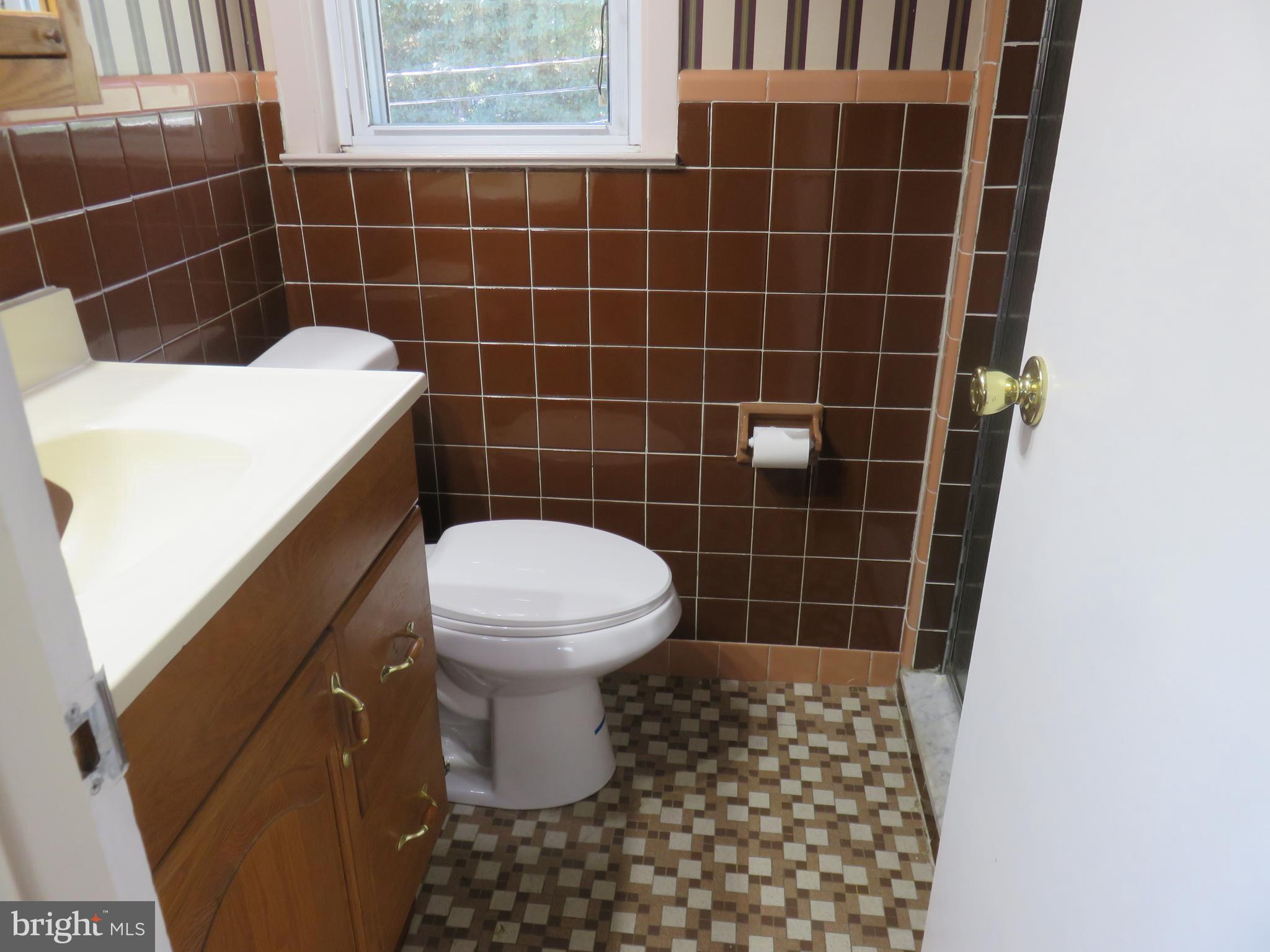 86 Kings Highway North Cherry Hill, NJ 08034 - Photo 8 of 22 a bathroom with a toilet and a sink