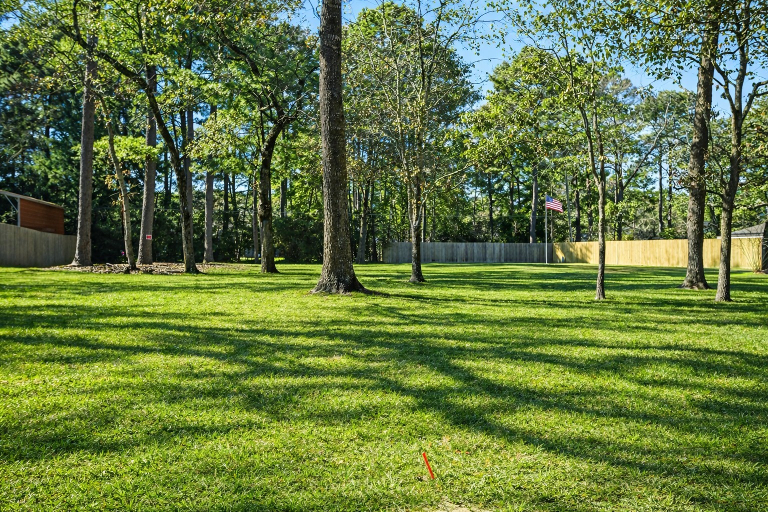 0 Candy Street Pinehurst, TX 77362 - Photo 2 of 2 a view of a trees in a park
