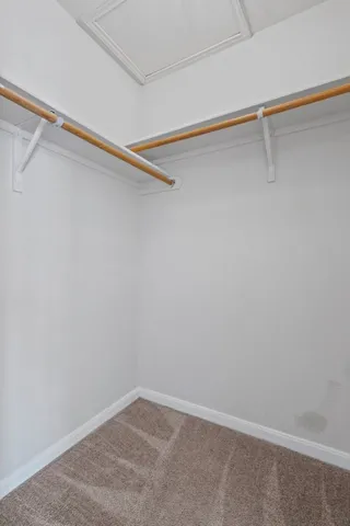 a view of a room with racks on the wall