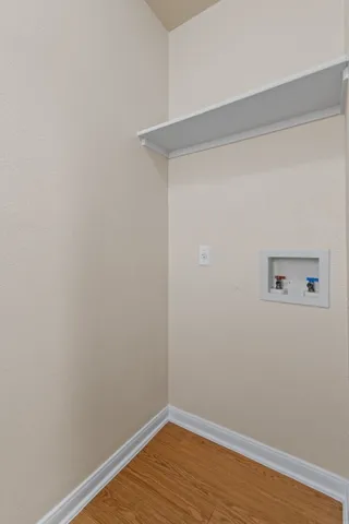 a view of small space with racks on the wall