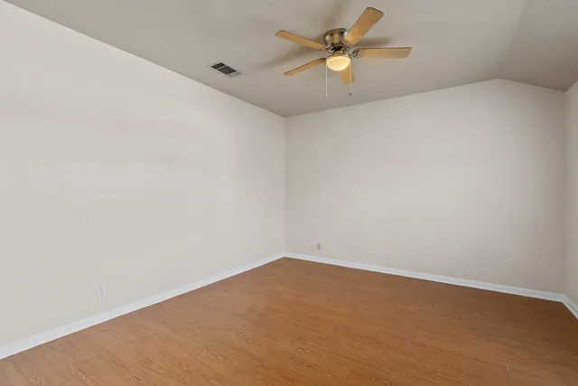 a view of a big room with carpet