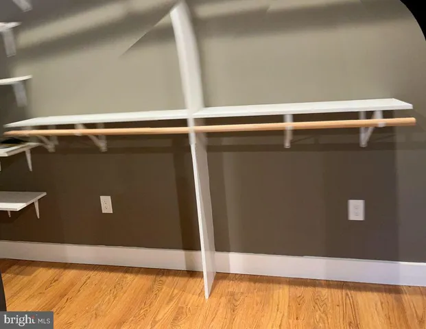 a view of a livingroom with wooden floor