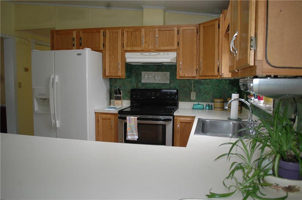 1997 N Road Cornish, ME 04020 - Photo 8 of 21 U shaped kitchen with lots of...
