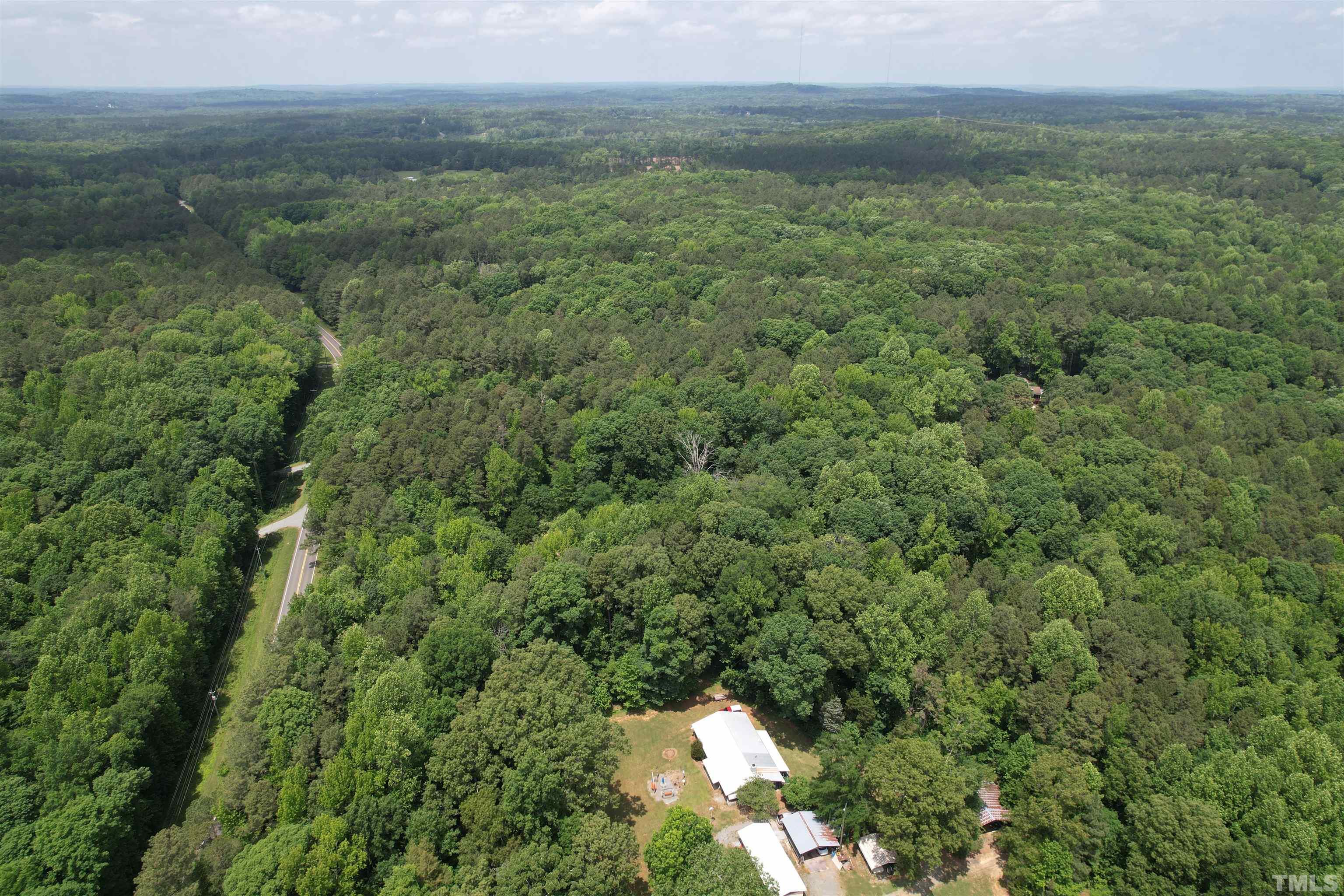 Tbd2 Hamlets Chapel Road Pittsboro, NC 27312 - Photo 4 of 10 a view of a yard with an outdoor space
