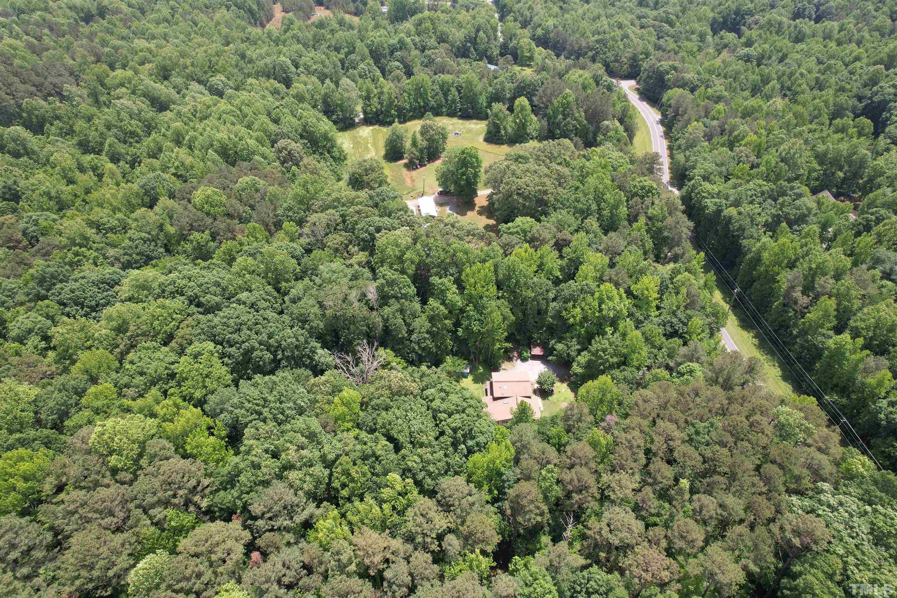 Tbd2 Hamlets Chapel Road Pittsboro, NC 27312 - Photo 7 of 10 a view of a house with a park