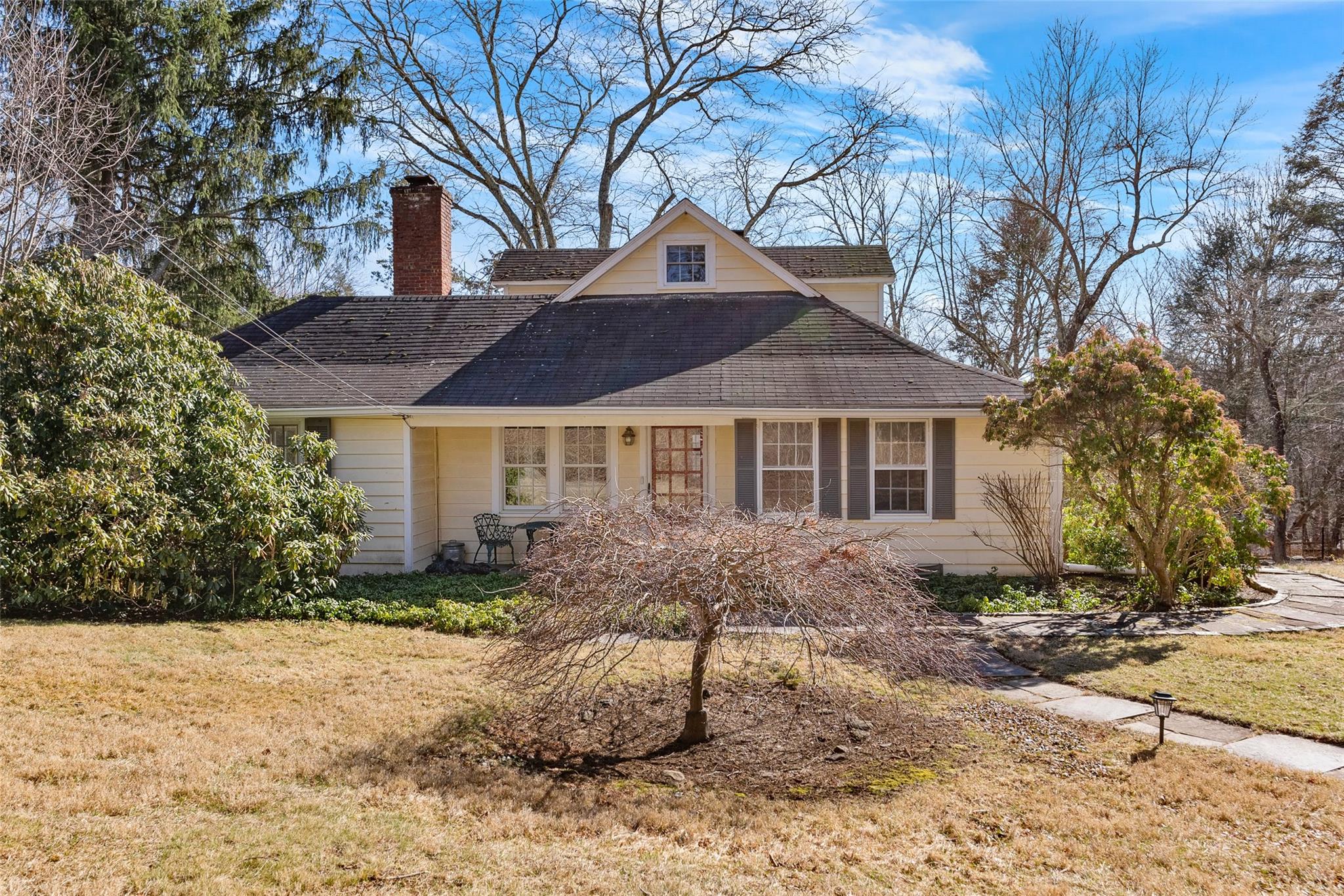 1385-1415 Baptist Church Road Yorktown Heights, NY 10598 - Photo 1 of 38 a front view of house with yard and trees around
