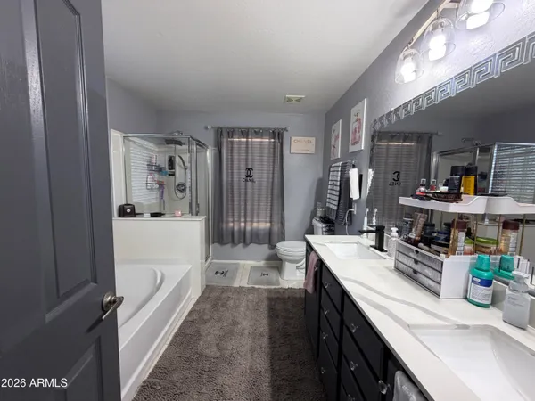 a kitchen with counter top space and cabinets
