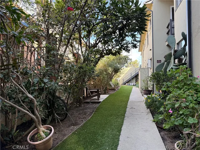 a view of a backyard with garden