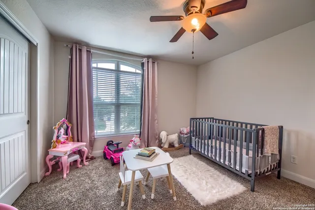 a bedroom with furniture and a bed