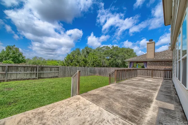 a view of a backyard with a garden