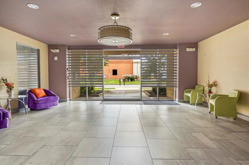 1100 West Trinity Mills Road Carrollton, TX 75006 - Photo 11 of 30 a view of a livingroom with furniture and window