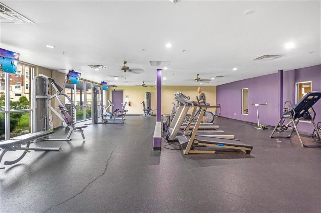 1100 West Trinity Mills Road Carrollton, TX 75006 - Photo 13 of 30 a view of a room with gym equipment