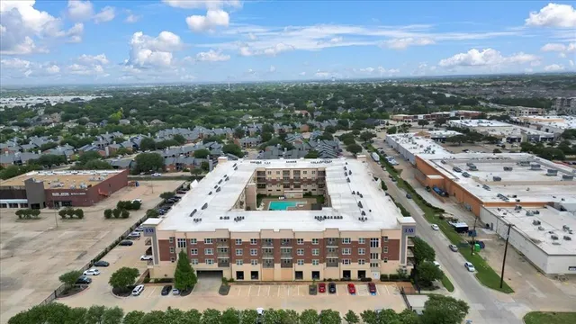 an aerial view of a large building and front view of a building