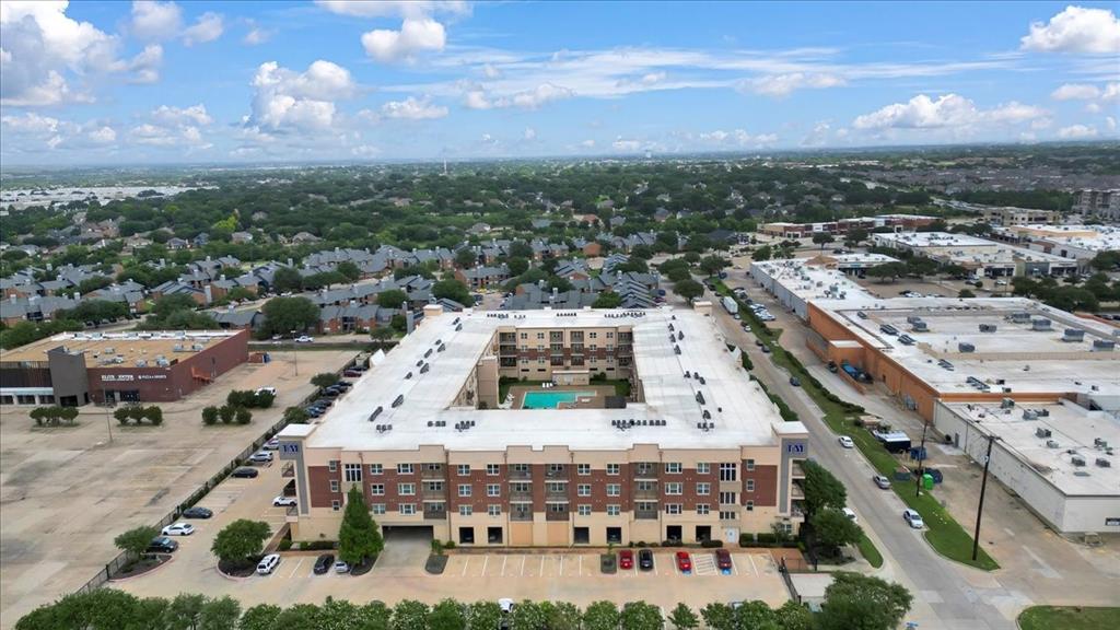 1100 West Trinity Mills Road Carrollton, TX 75006 - Photo 26 of 30 an aerial view of a large building and front view of a building