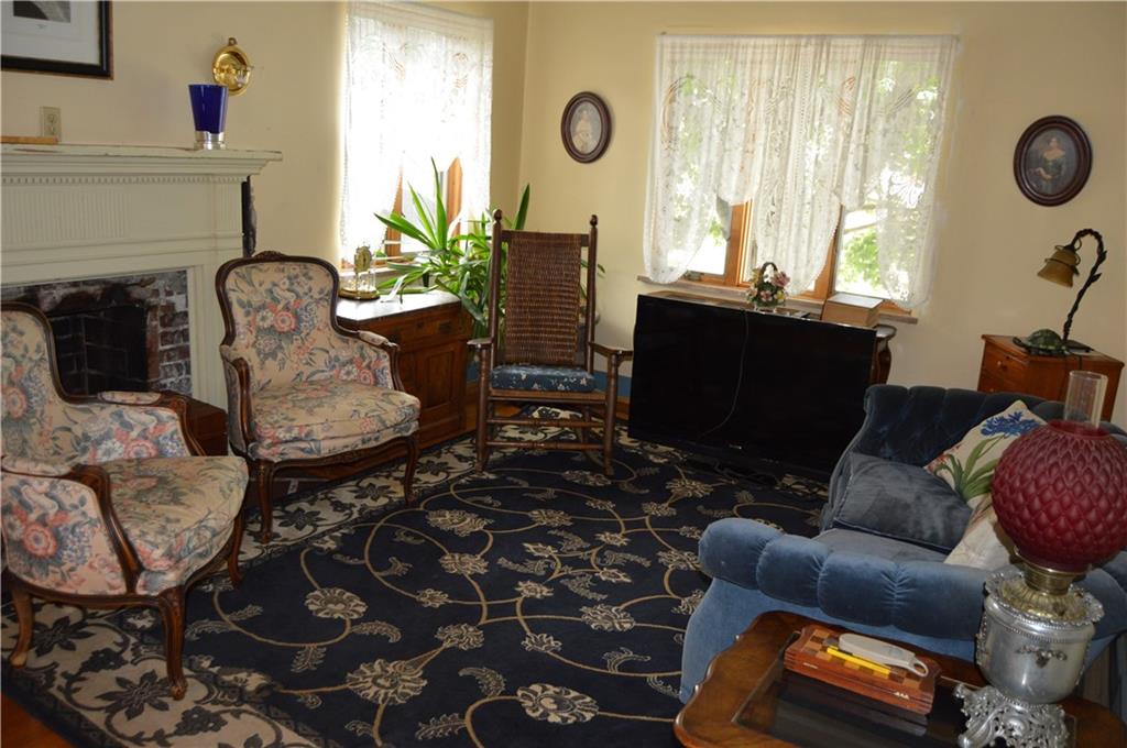 1098 Burtner Road Natrona Heights, PA 15065 - Photo 17 of 25 a living room with furniture and a window