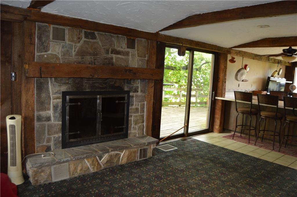 1098 Burtner Road Natrona Heights, PA 15065 - Photo 6 of 25 a view of a room that has a fireplace