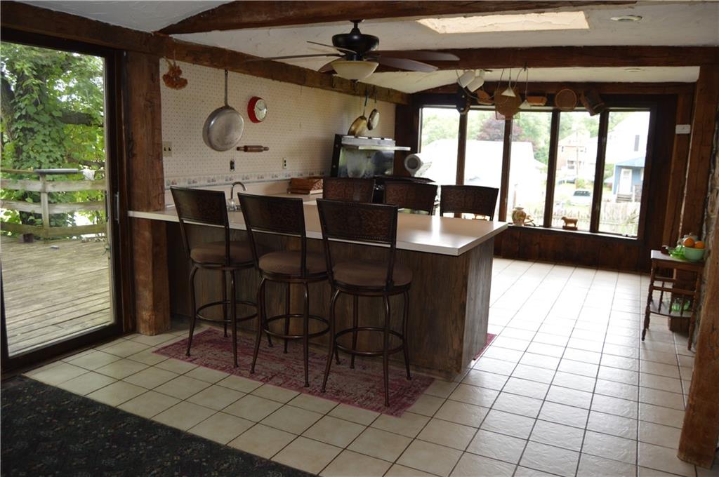 1098 Burtner Road Natrona Heights, PA 15065 - Photo 9 of 25 a view of a chairs and table in a room