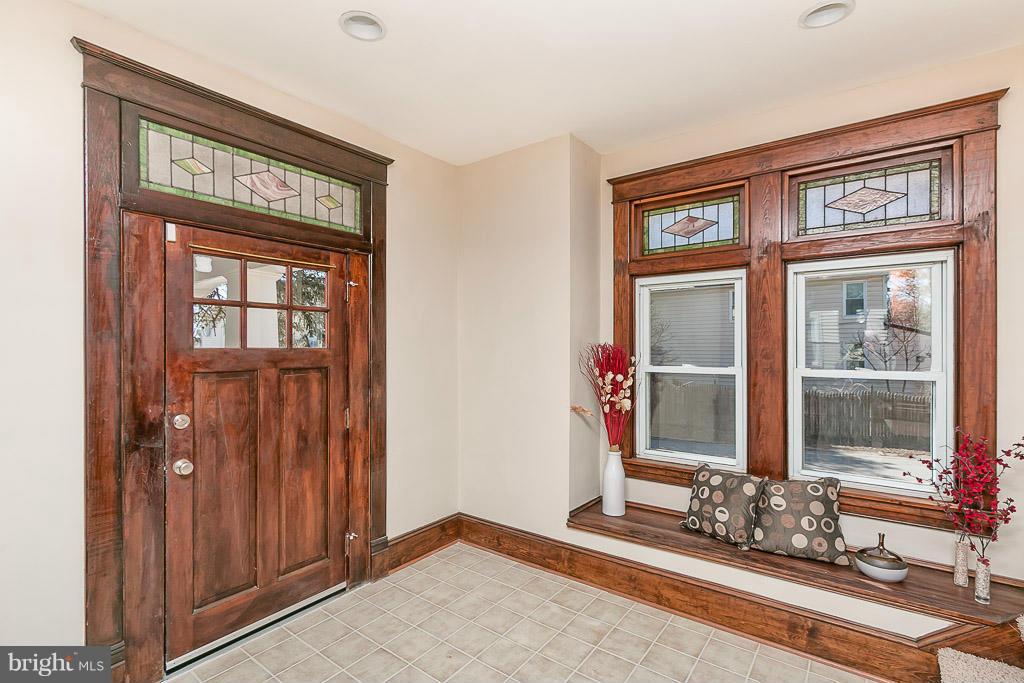 4400 Raspe Avenue Baltimore, MD 21206 - Photo 6 of 30 Foyer with Ceramic Tile and Stained Glass!