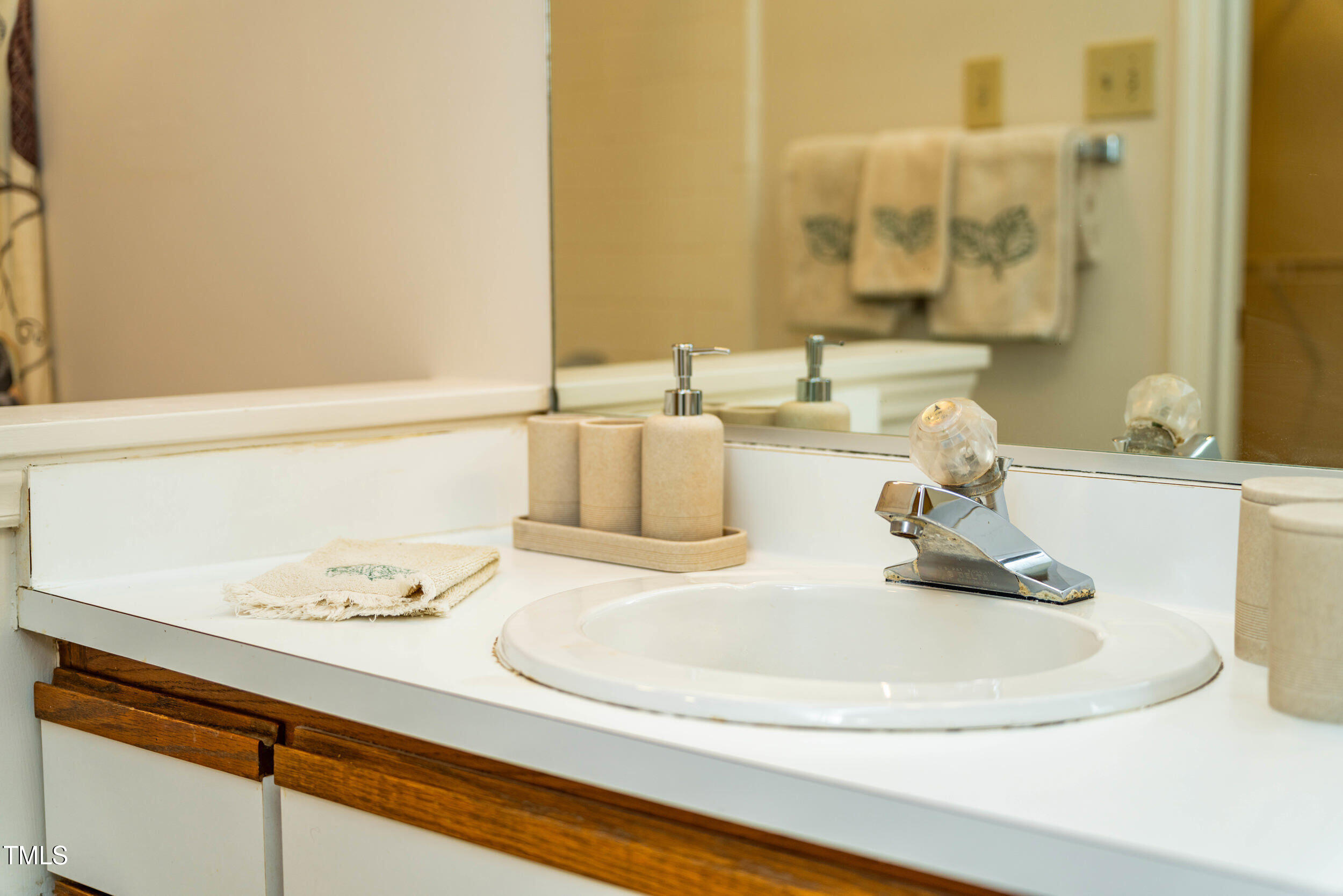 1000 Brighthurst Drive, Unit 103 Raleigh, NC 27605 - Photo 13 of 24 primary vanity