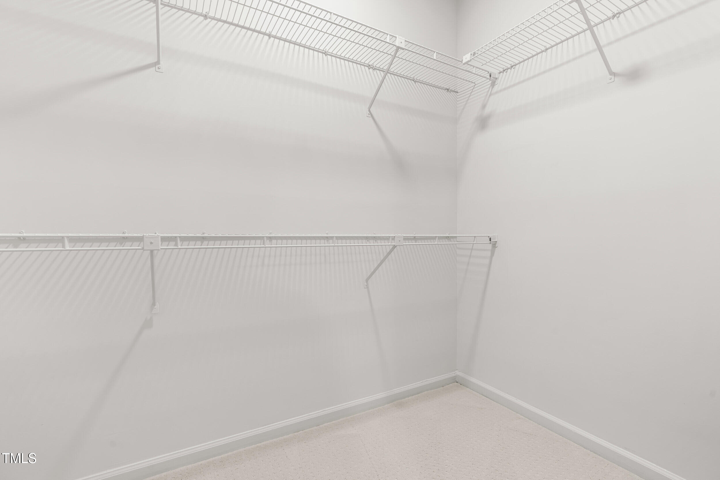 1000 Brighthurst Drive, Unit 103 Raleigh, NC 27605 - Photo 14 of 24 primary closet