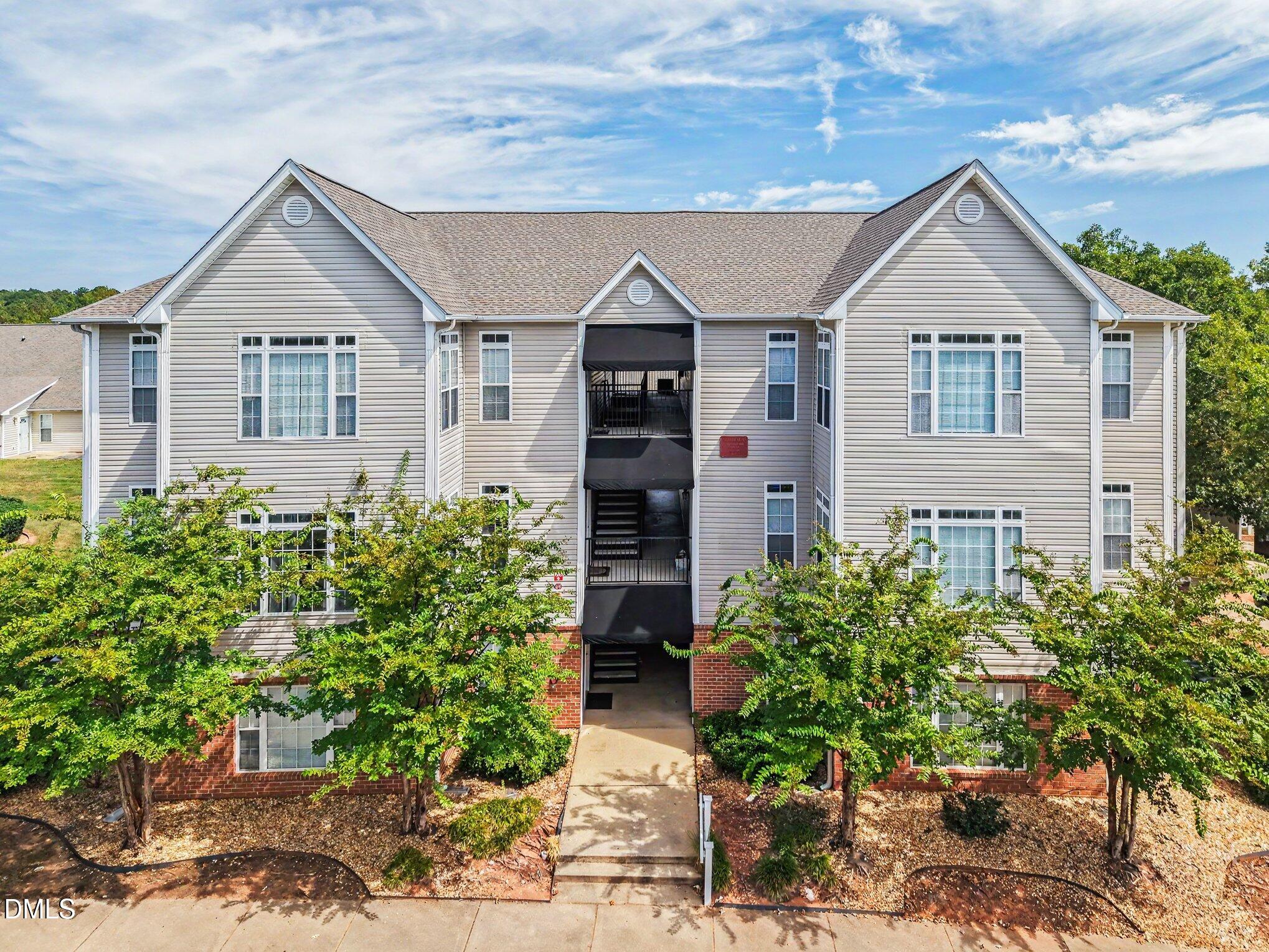 2521 Friedland Place Raleigh, NC 27617 - Photo 1 of 21 2nd-floor condo living designed for a low-maintenance lifestyle, featuring private shaded views and easy access to shared amenities.