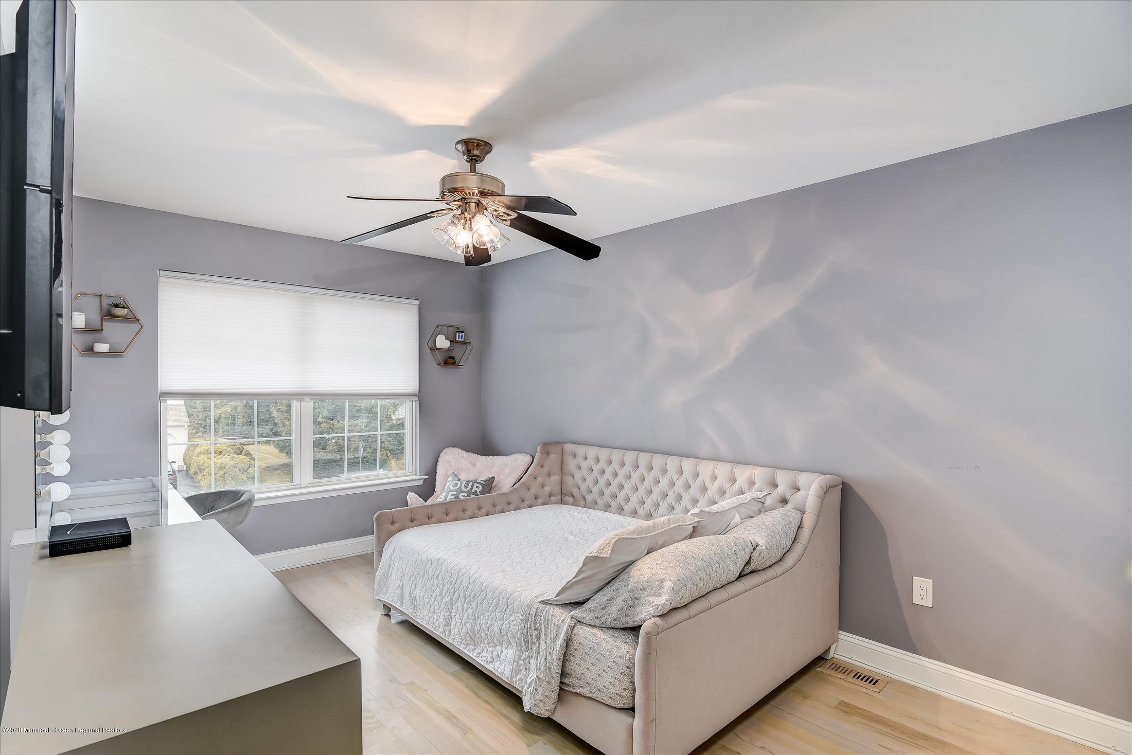 11 Sun Hollow Road Howell, NJ 07731 - Photo 14 of 27 a bedroom with a large bed and a large window
