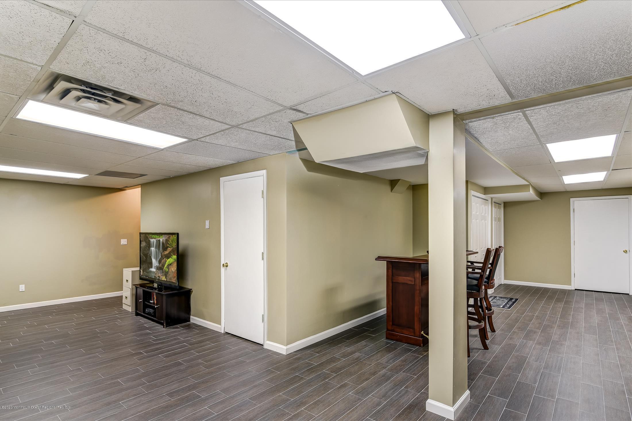 11 Sun Hollow Road Howell, NJ 07731 - Photo 20 of 27 a view of empty room with wooden floor
