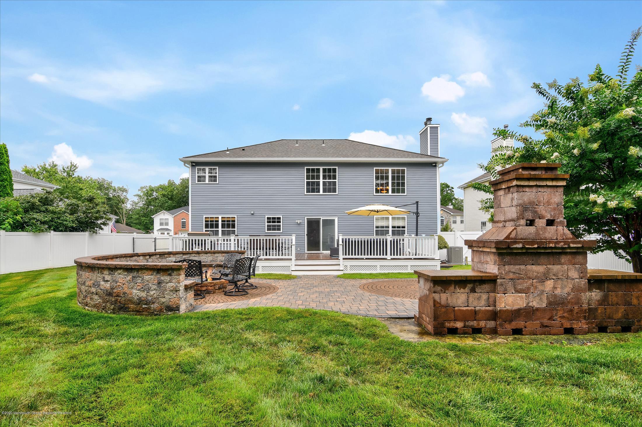 11 Sun Hollow Road Howell, NJ 07731 - Photo 27 of 27 a view of a house with a yard porch and sitting area