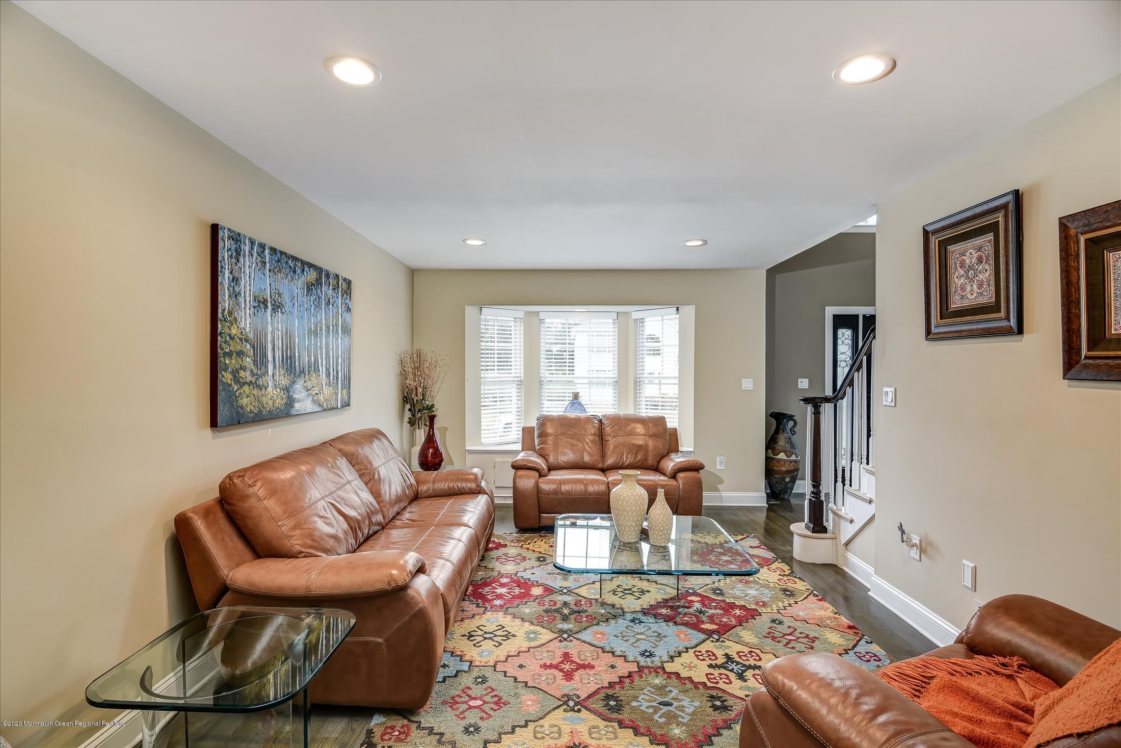 11 Sun Hollow Road Howell, NJ 07731 - Photo 5 of 27 a living room with furniture and a window