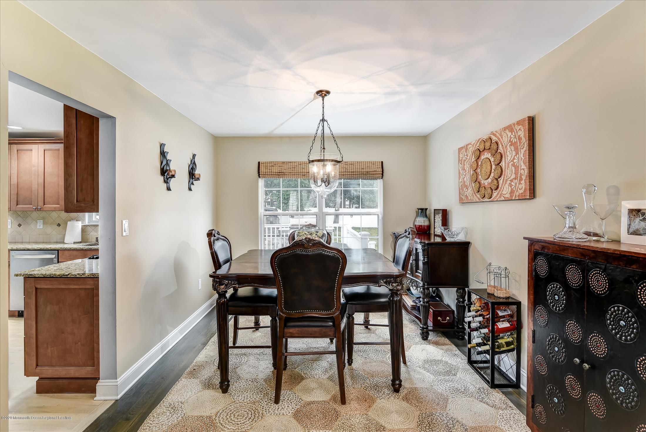 11 Sun Hollow Road Howell, NJ 07731 - Photo 6 of 27 a view of a dining room with furniture window and wooden floor
